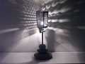 2 - Lampe à poser composée de quelques galets et d'une râpe à fromage pour une déco originale